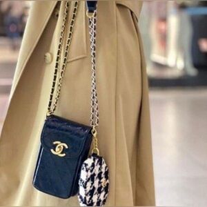 CHANEL Black Quilted Mini Bag with Gold Accents